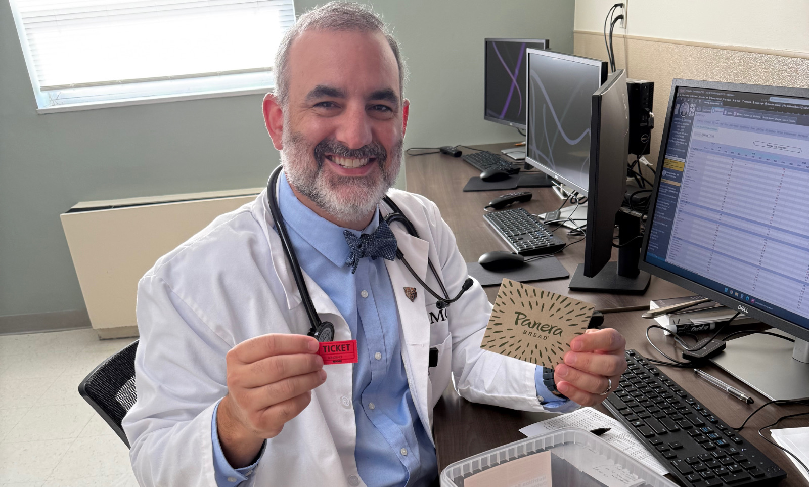 Dr. Varn draws the lucky ticket for a gift card.